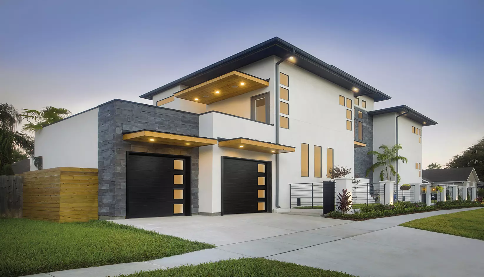 Insulated modern steel garage door in black on a contemporary Washington home